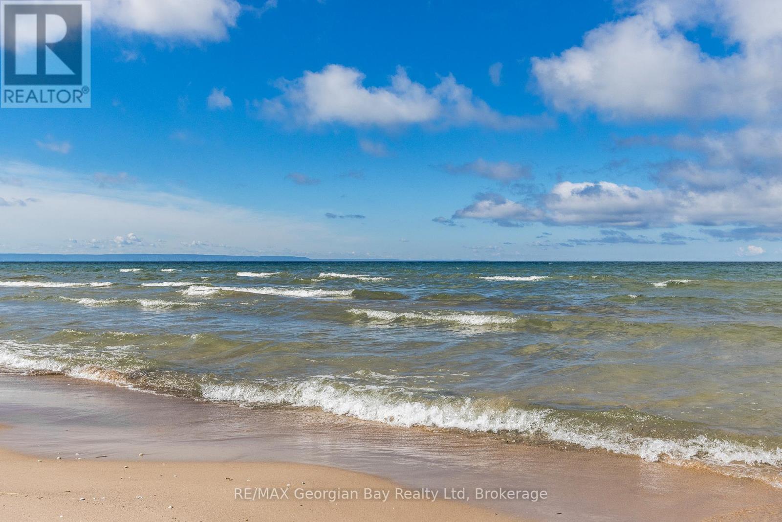 750 Tiny Beaches Road S, Tiny, Ontario  L0L 2T0 - Photo 5 - S12935366