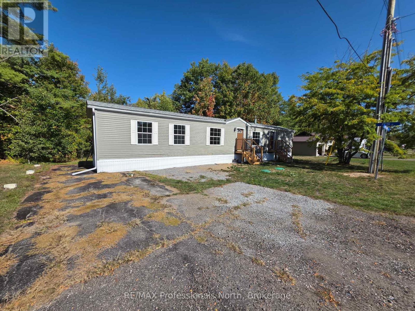 1013 Seventh Lane, Minden Hills, Ontario  K0M 2K0 - Photo 3 - X12944644